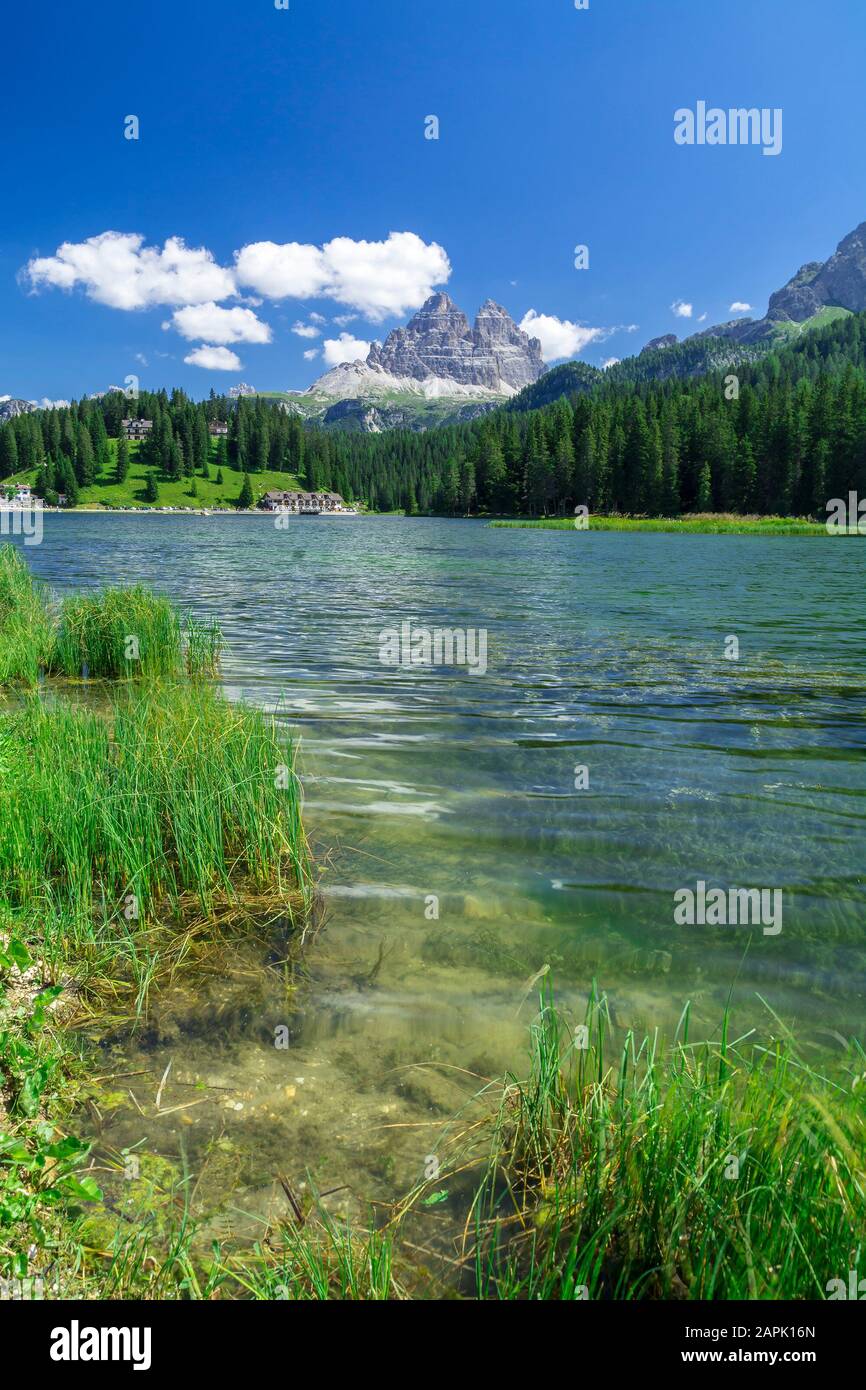 Tre Cime di Lavaredo view from Misurina lake in Dolomites, Italy in summer Stock Photo