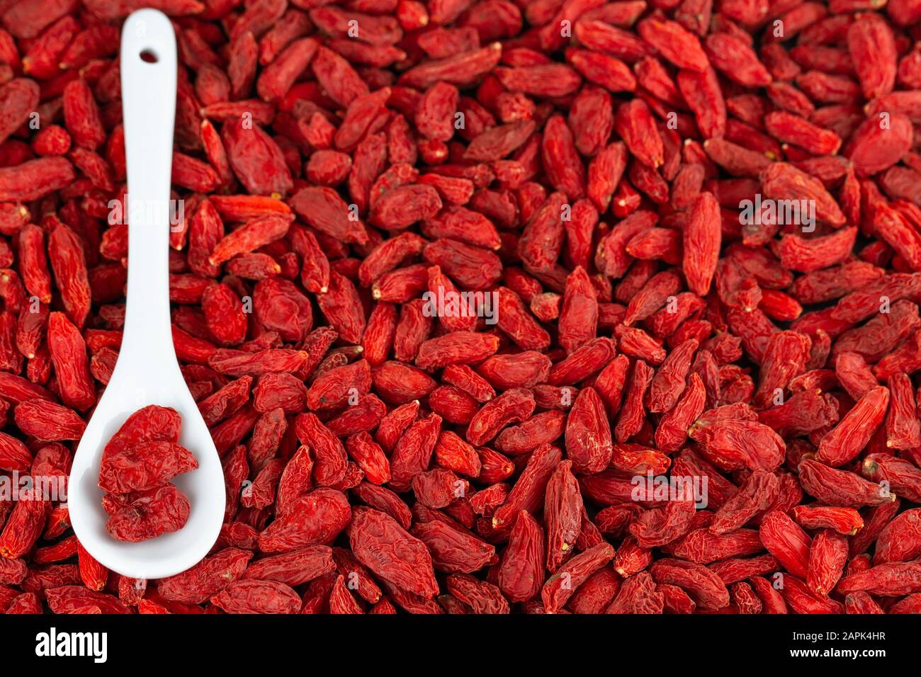 Goji Berries As Organic Red Berry Background Stock Photo