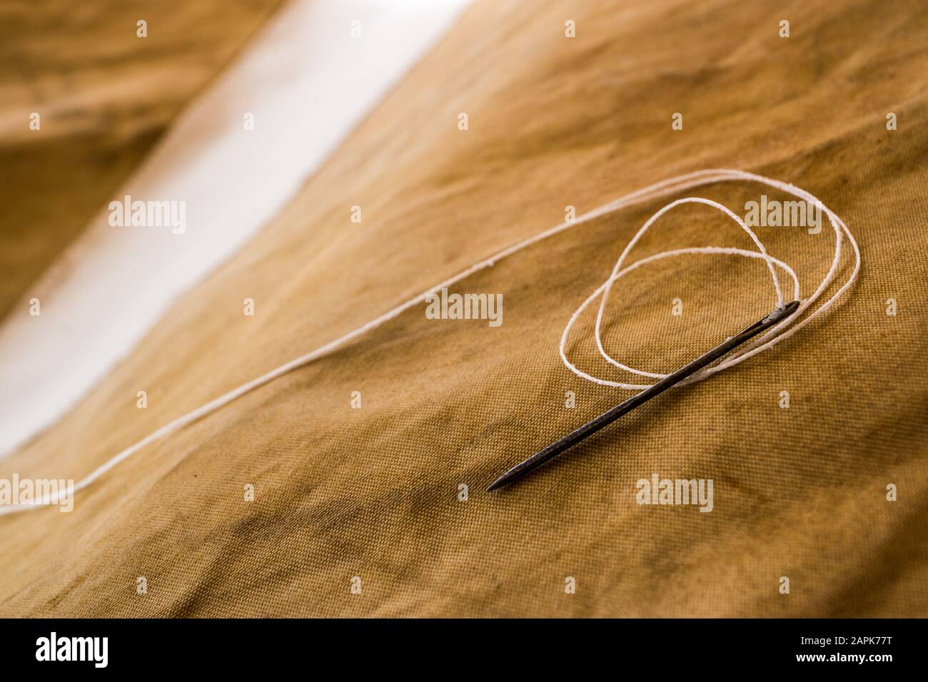 Old sewing needle Stock Photo