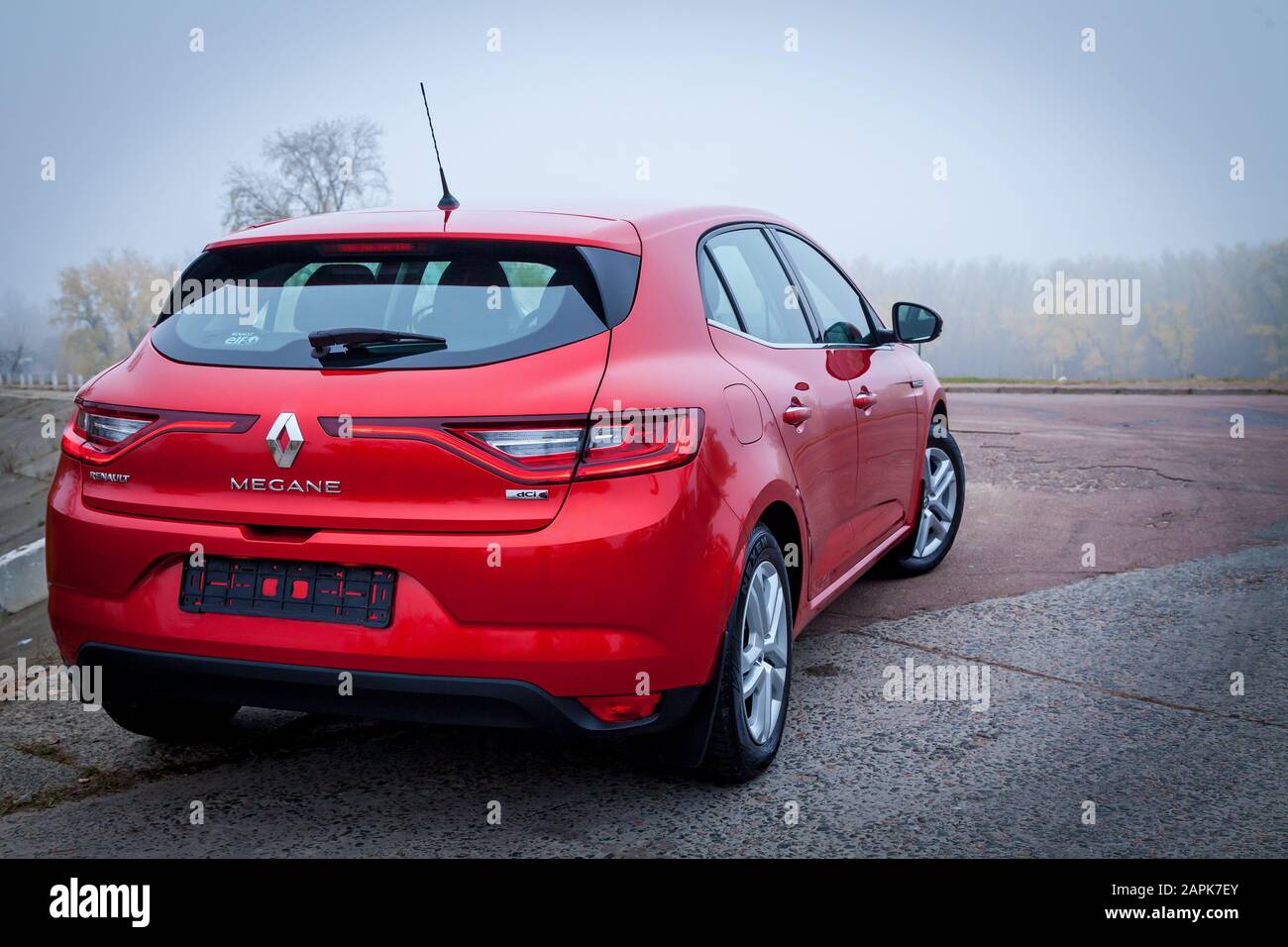 Kiev September 24, 2019: A new car Renault Megane Sedan red color is parked in the autumn park with many fallen leaves Stock Photo - Alamy