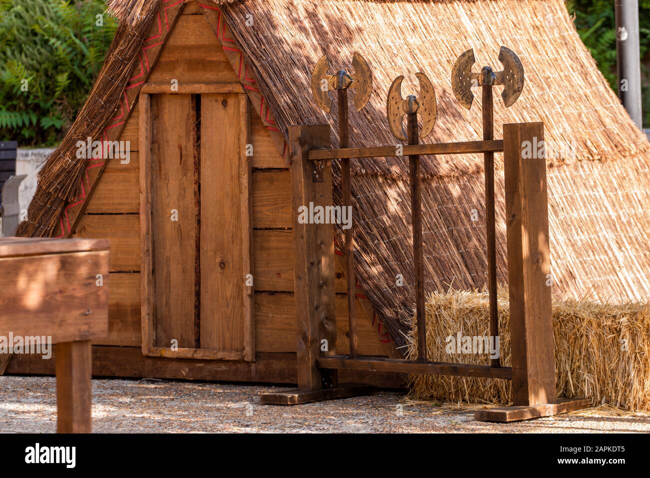 View of a traditional medieval wooden hut on display at a medieval fair ...