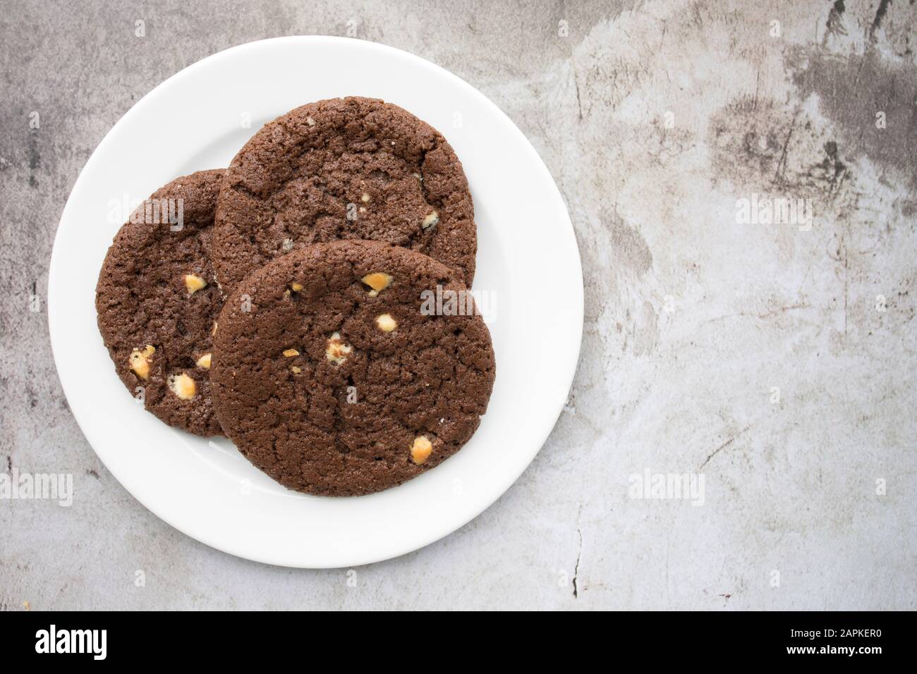 Plate of Chocolate Macadamia Nut Cookies Stock Photo