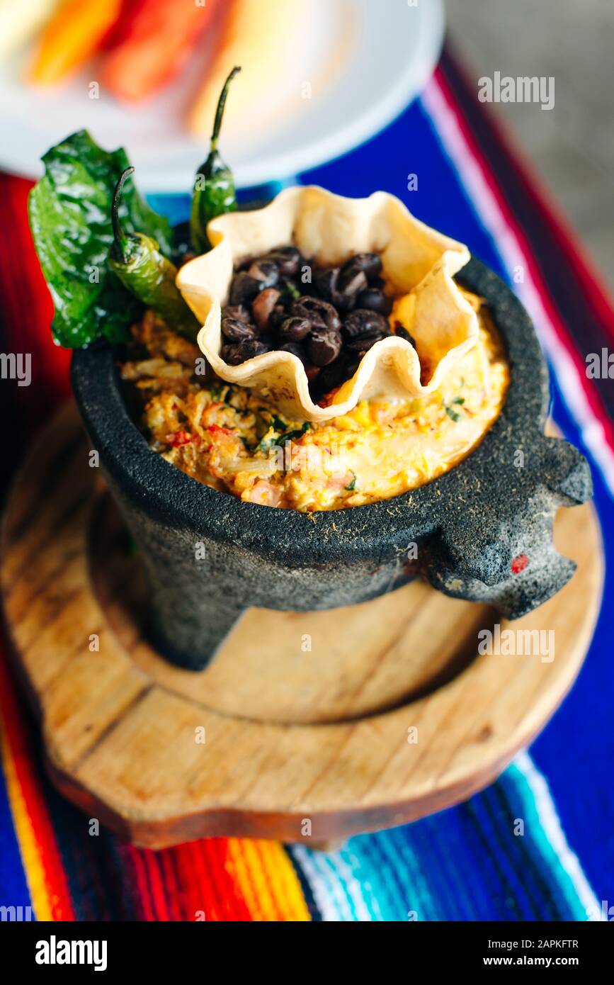rice, beans and chili peppers in a traditional Mexican plate. Mexican food Stock Photo Alamy