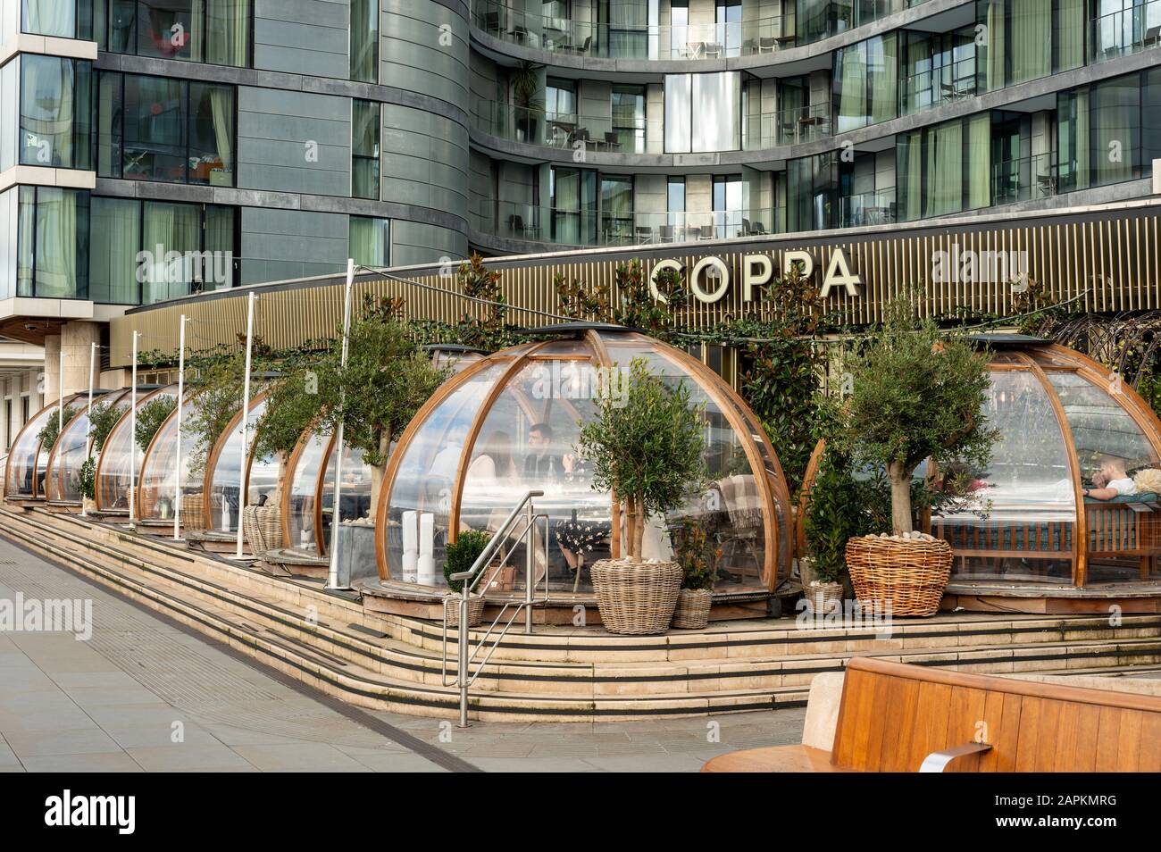 Riverside igloos at Coppa Club Tower Bridge Restaurant and Cafe on Three Quays Walk in London, UK as of 2020 Stock Photo
