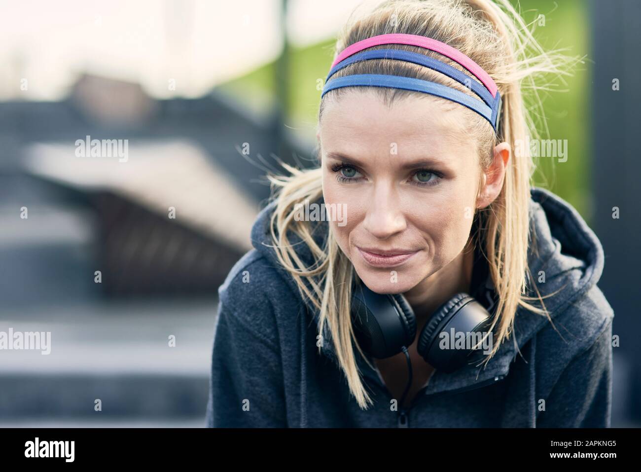 Runner taking short break during workout Stock Photo
