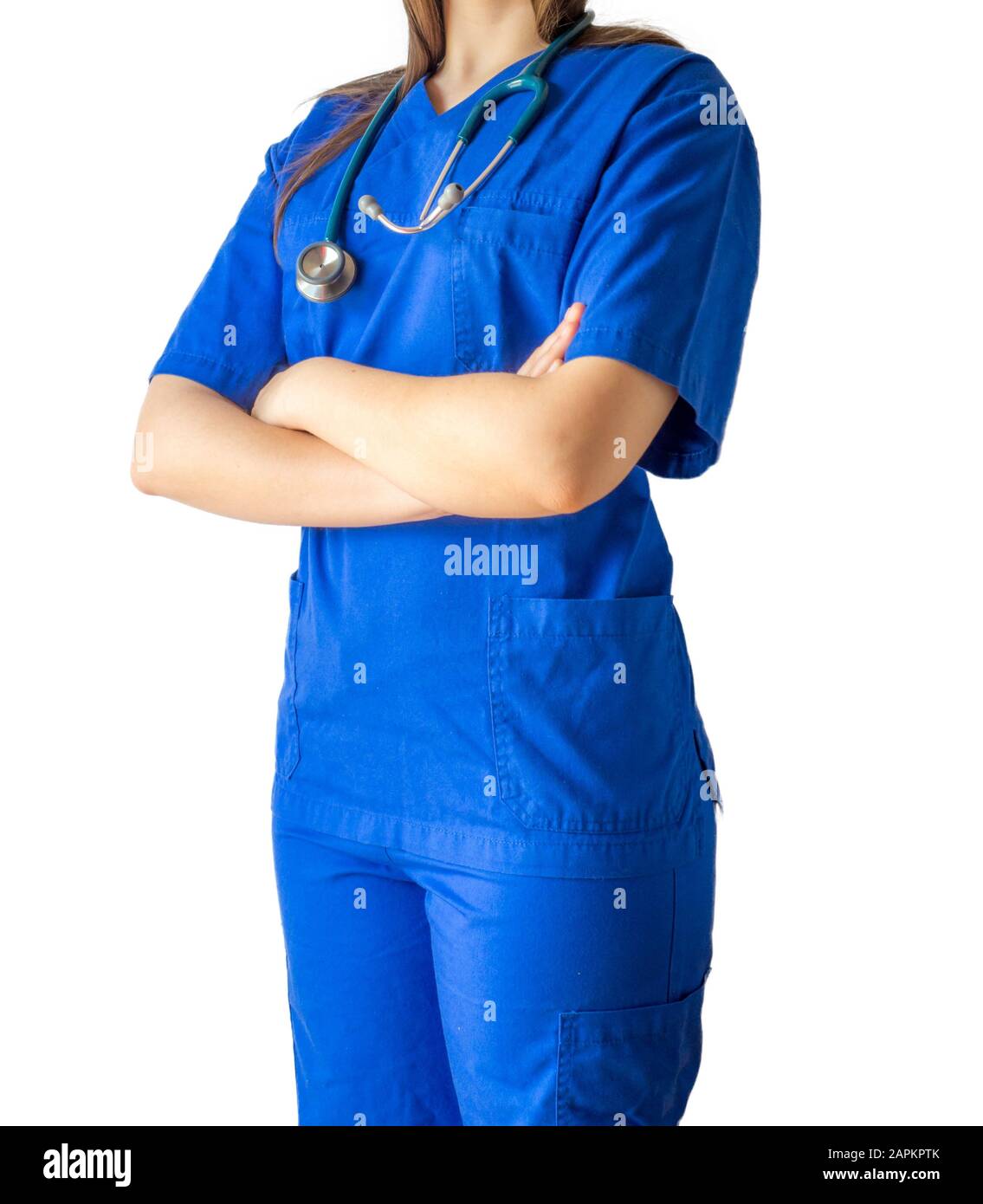 Young female doctor in a blue medical uniform standing confidently with  crossed hands Stock Photo - Alamy