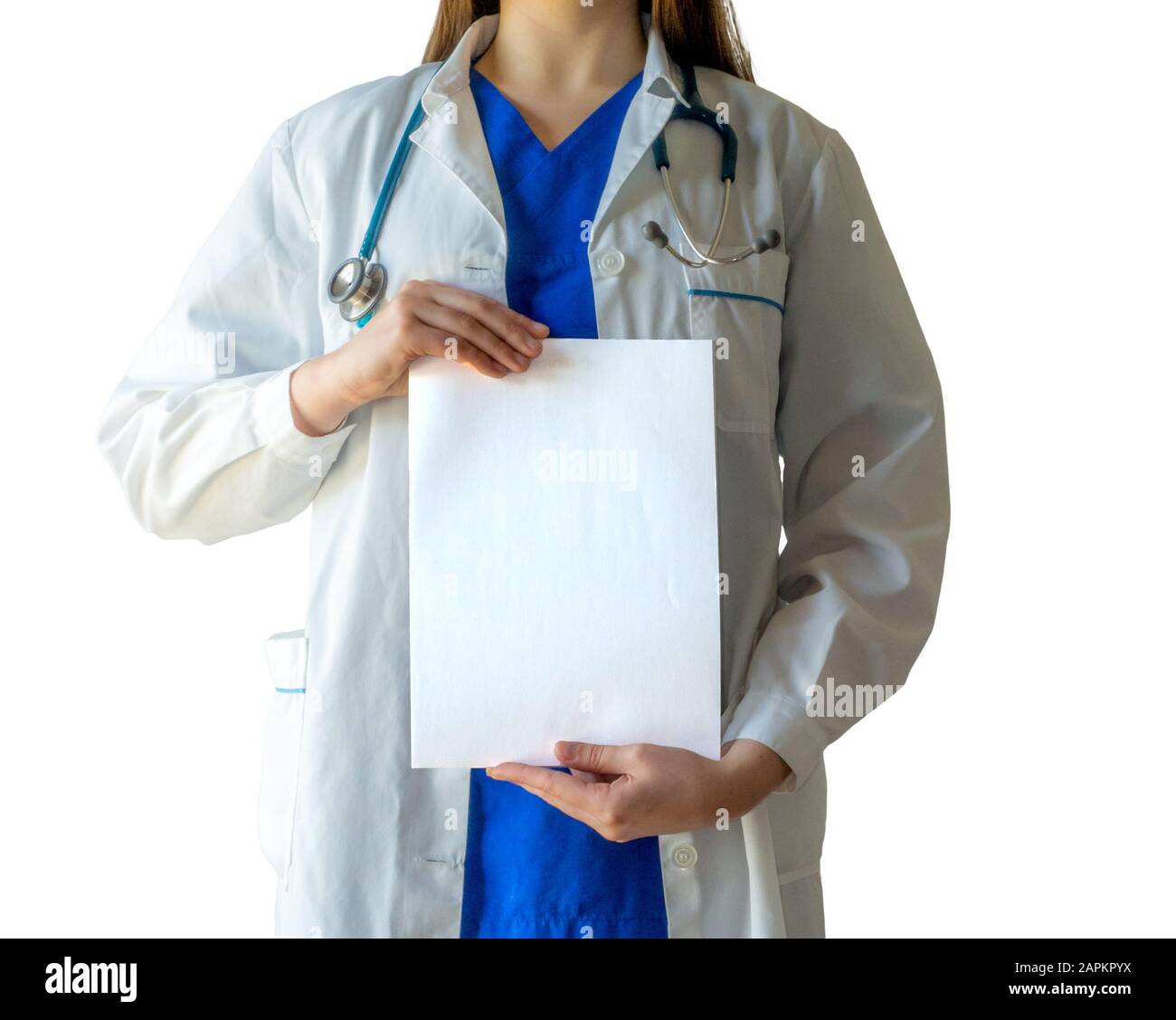 Female doctor in a blue medical uniform holding a blank white paper ...