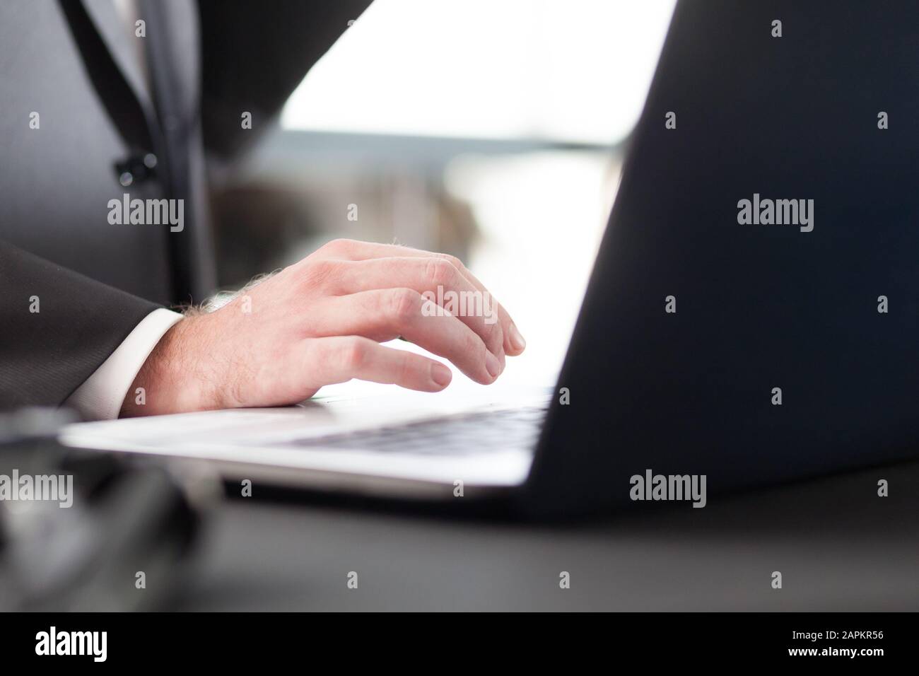 man's hand and laptop Stock Photo