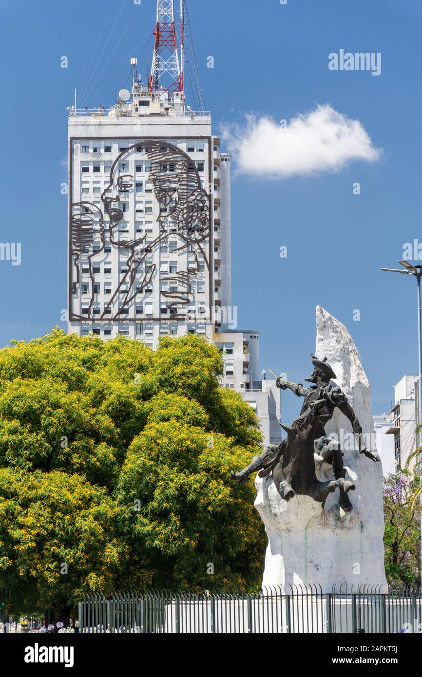 Beautiful view to white statue and Health Ministry building in central Buenos Aires, Argentina Stock Photo