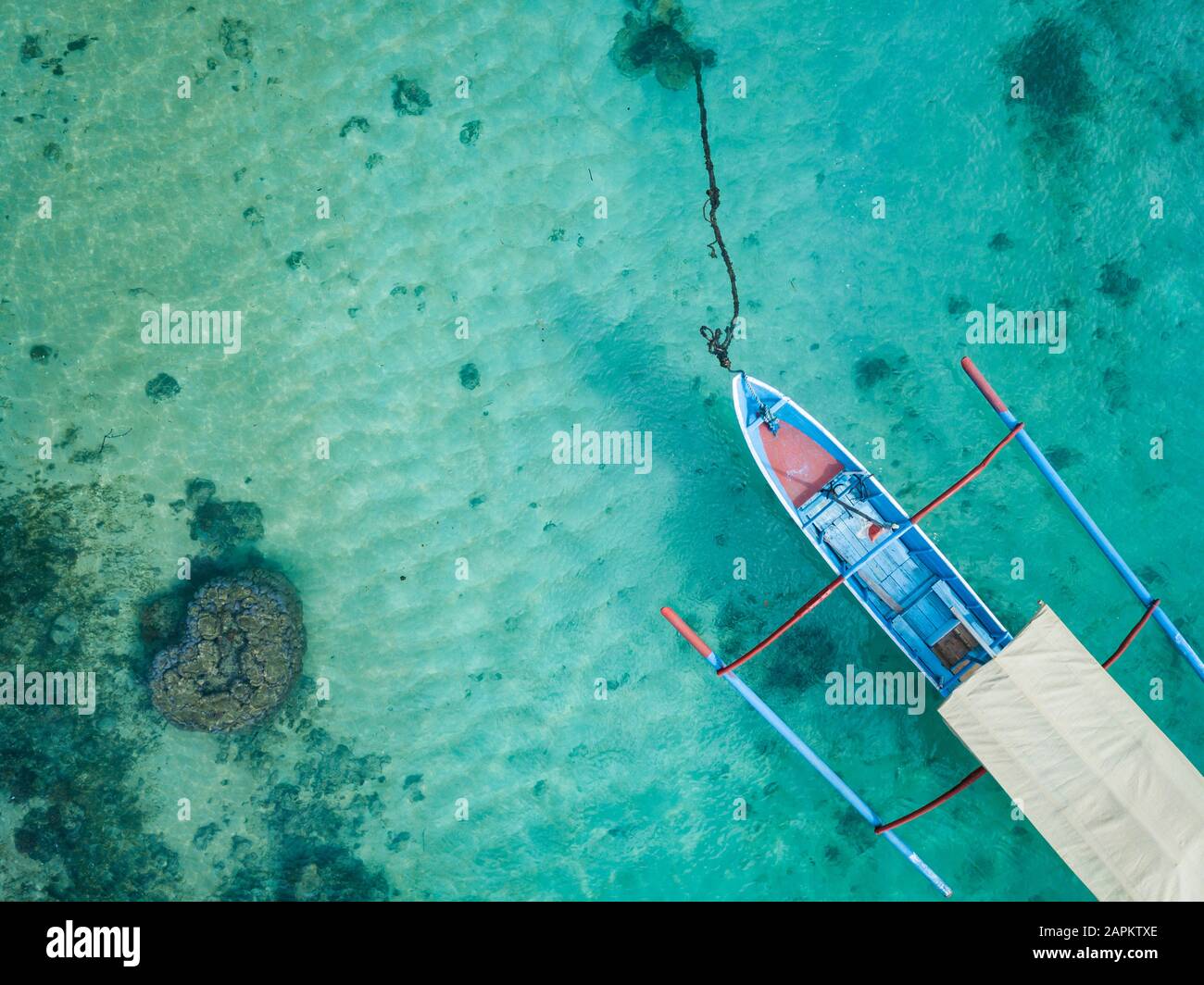 Indonesia, Subawa, Aerial view of outrigger boat Stock Photo