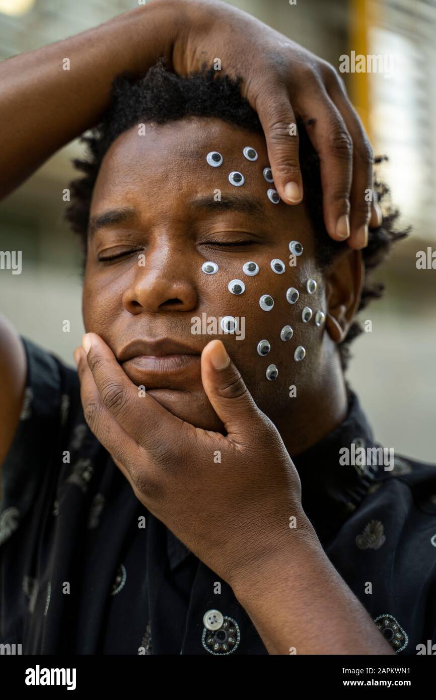 Black man eyes shut face hi-res stock photography and images - Alamy