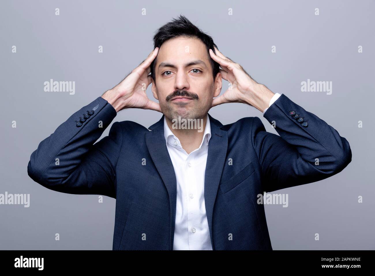 Person with hands on their head hi-res stock photography and images - Alamy