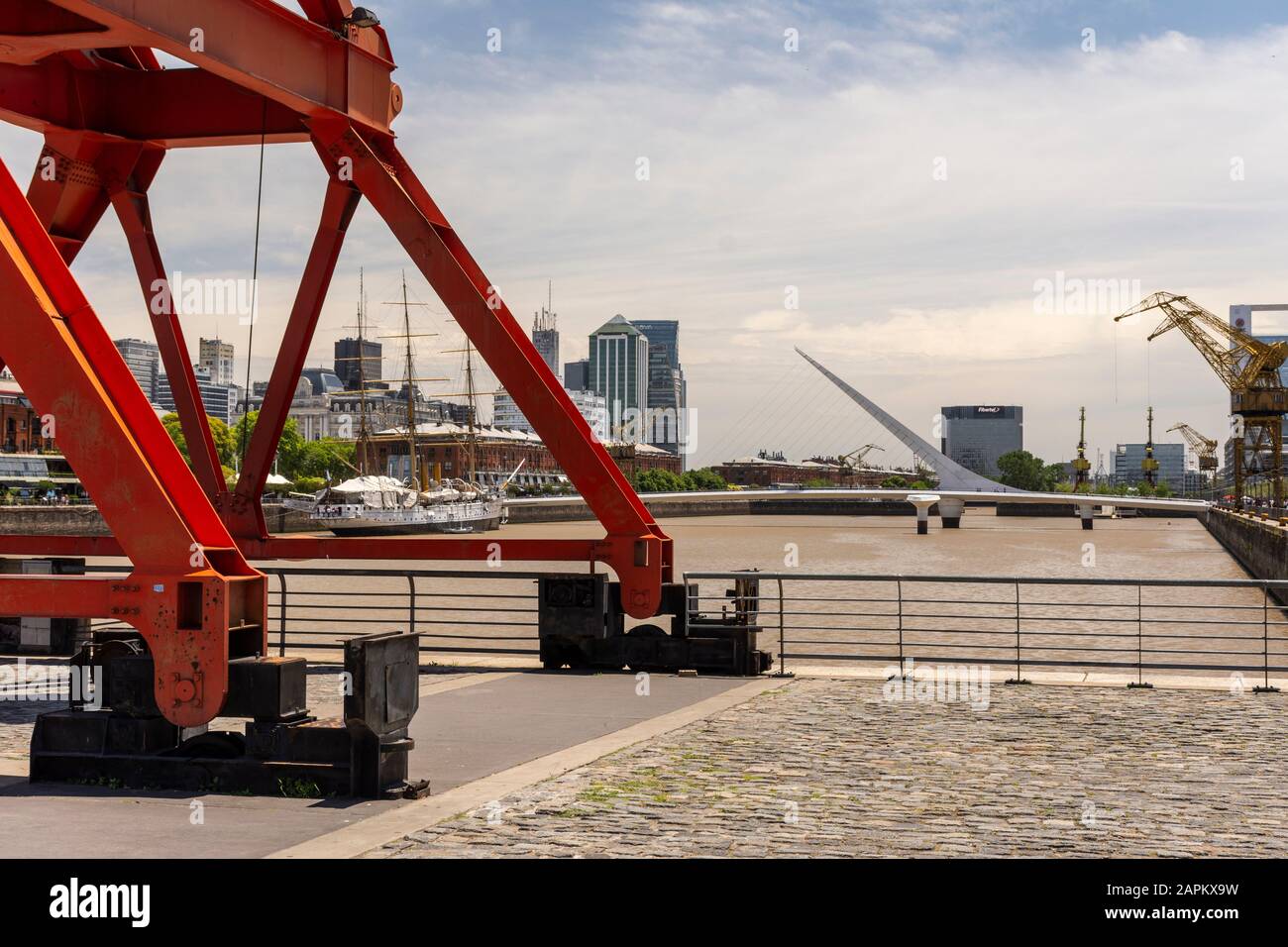 Beautiful view to crane, river and modern bridge in Puerto Madero, Buenos Aires, Argentina Stock Photo