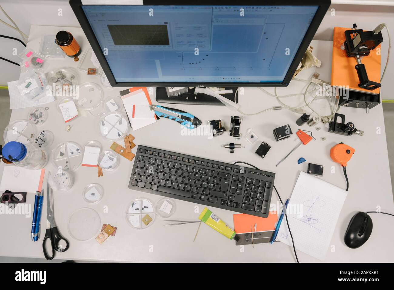 Messy desk of scientist in a laboratory Stock Photo - Alamy
