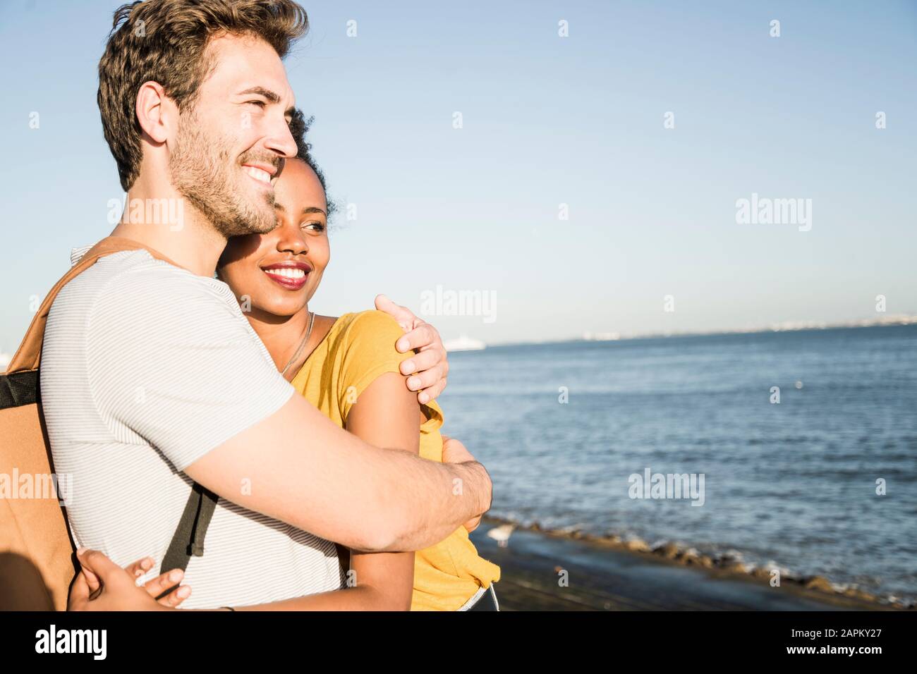 Young gay couple laughing hugging hi-res stock photography and images ...