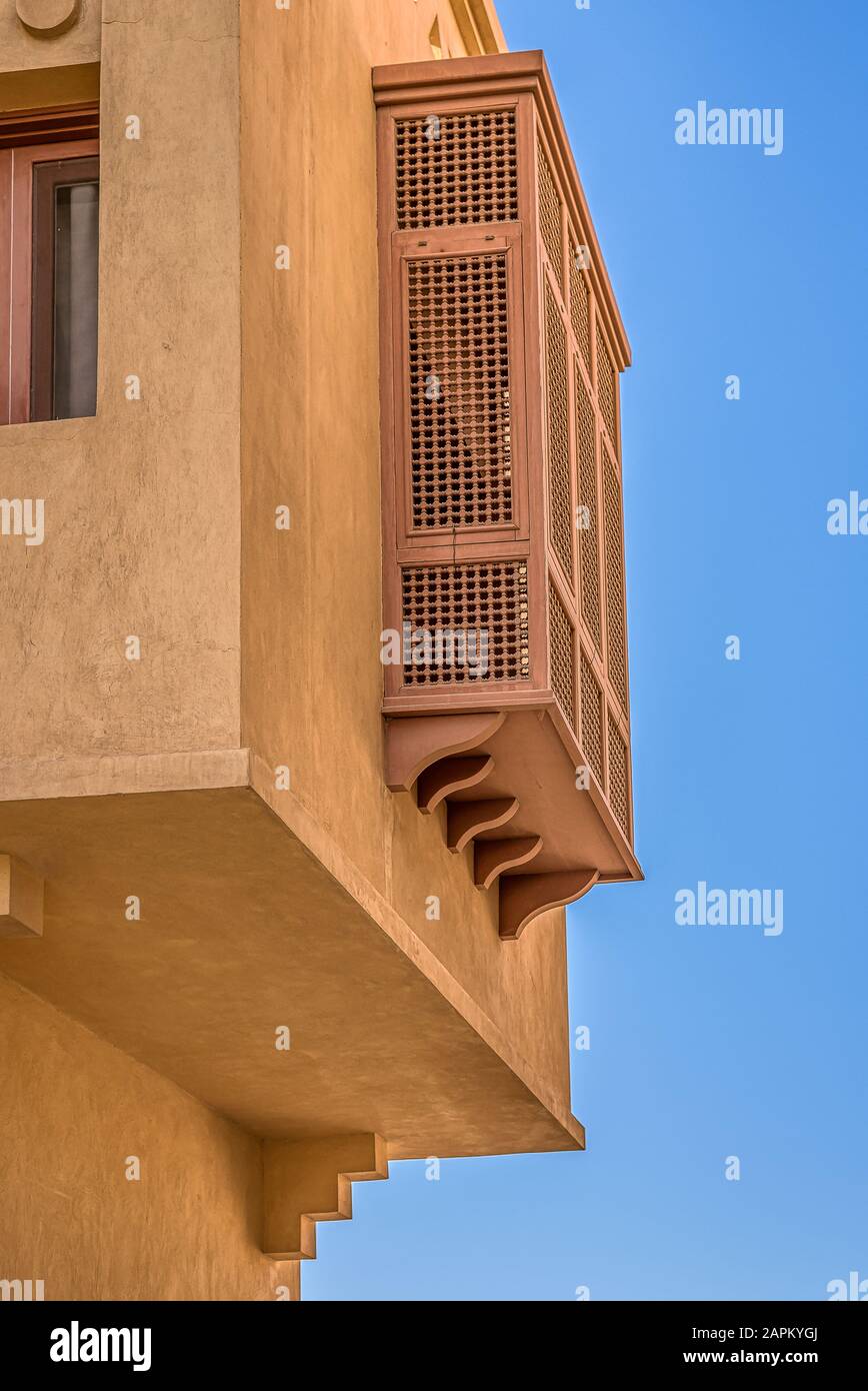 An Arabic bay window with small grilles against the blue sky in Egypt, January 11, 2020 Stock Photo