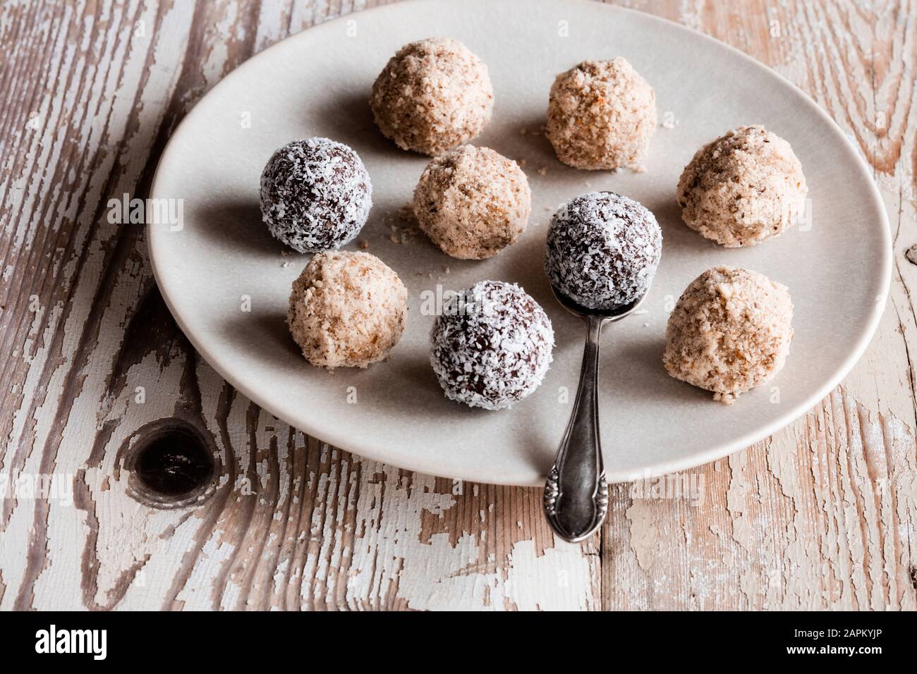 Vegan protein balls with millet, coconut, cocoa and nuts Stock Photo