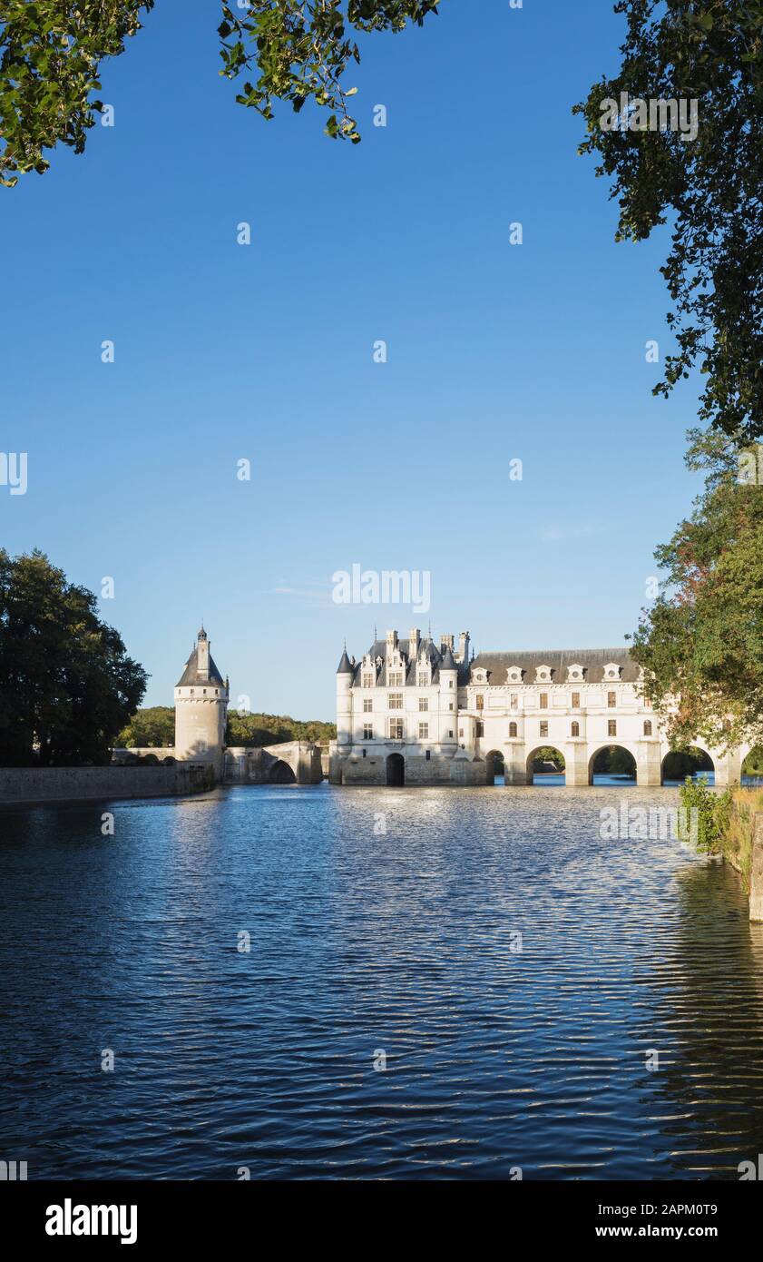 France, Centre-Val de Loire, Chenonceaux, Clear sky over Chateau de Chenonceau and Cher river Stock Photo