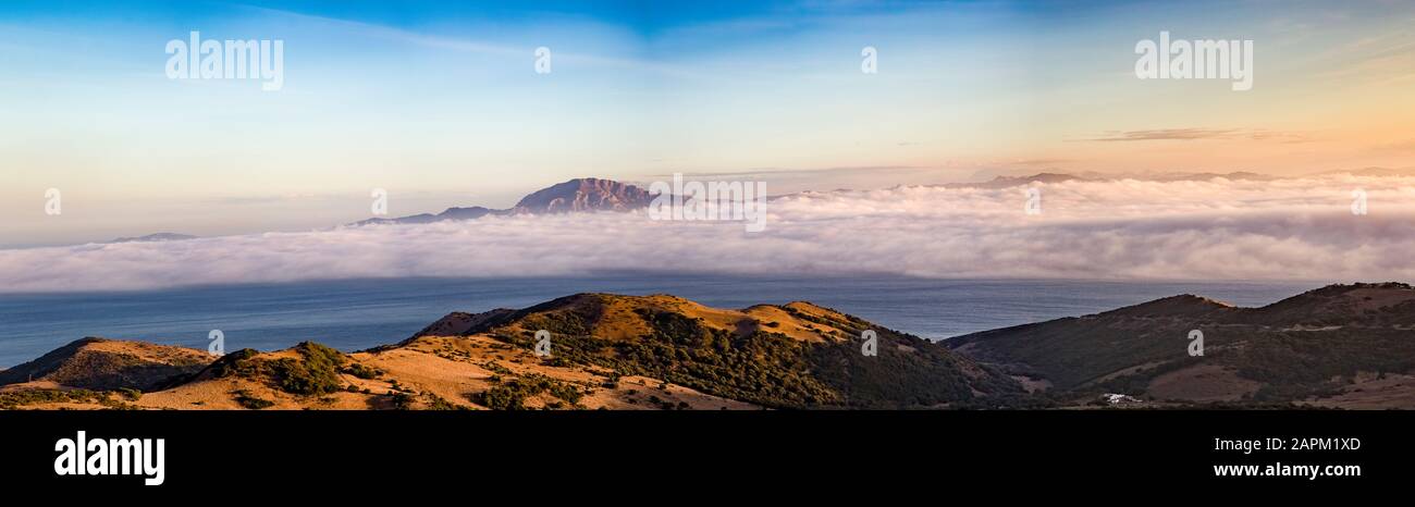 Spain, Panorama of clouds over Strait of Gibraltar at dusk Stock Photo