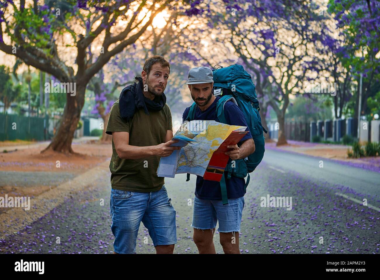 Backpackers with map on a street, Pretoria, South Africa Stock Photo ...
