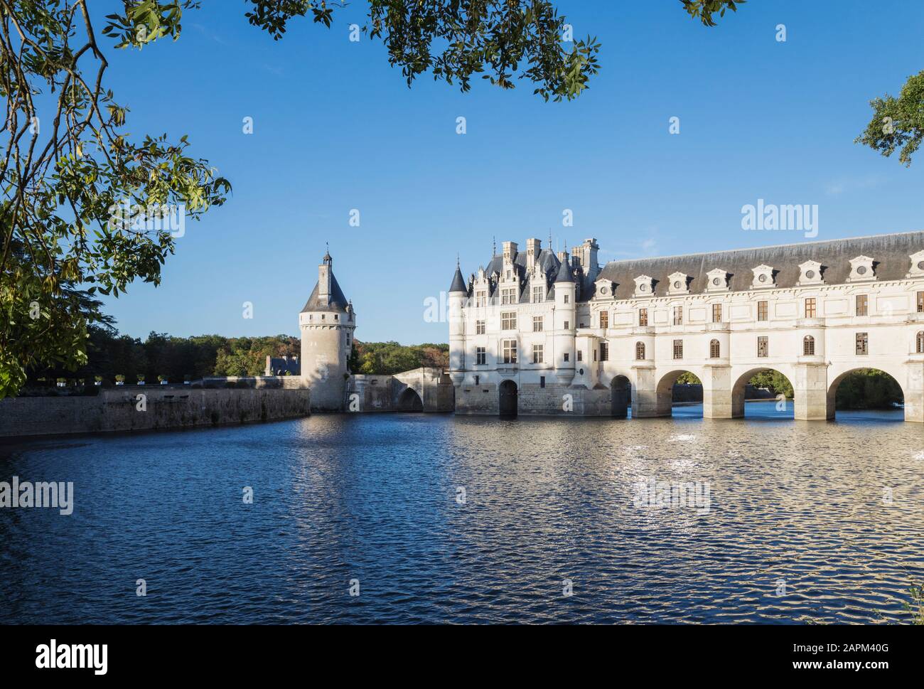 France, Centre-Val de Loire, Chenonceaux, Clear sky over Chateau de Chenonceau and Cher river Stock Photo