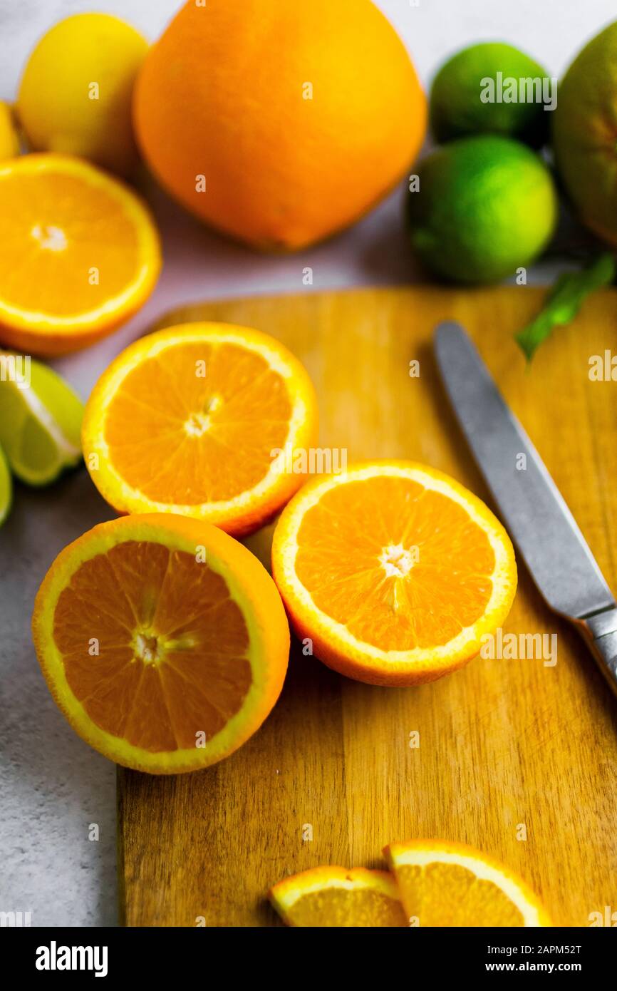 Oranges sliced on board hi res stock photography and images Alamy