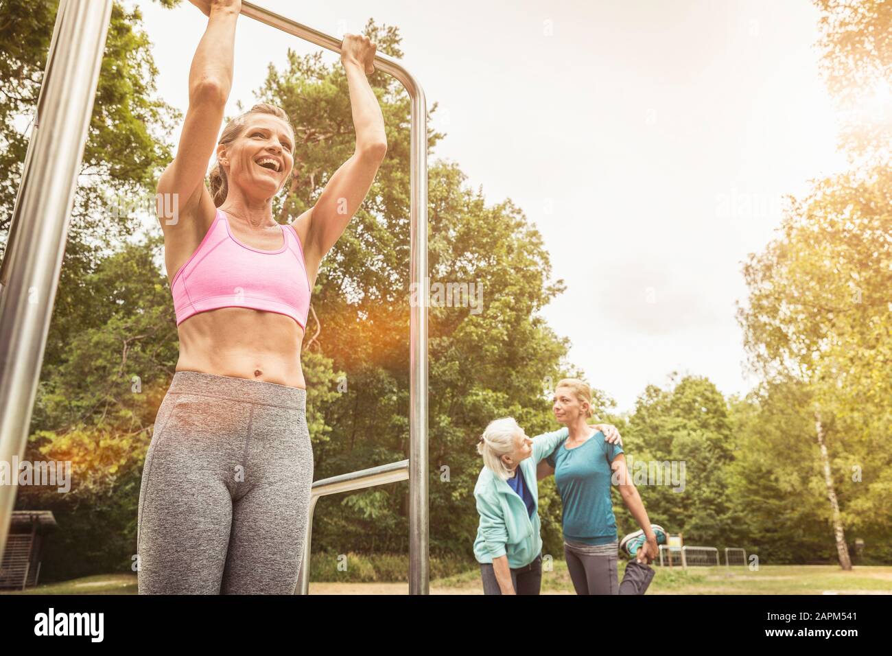 Women during workout in a park Stock Photo