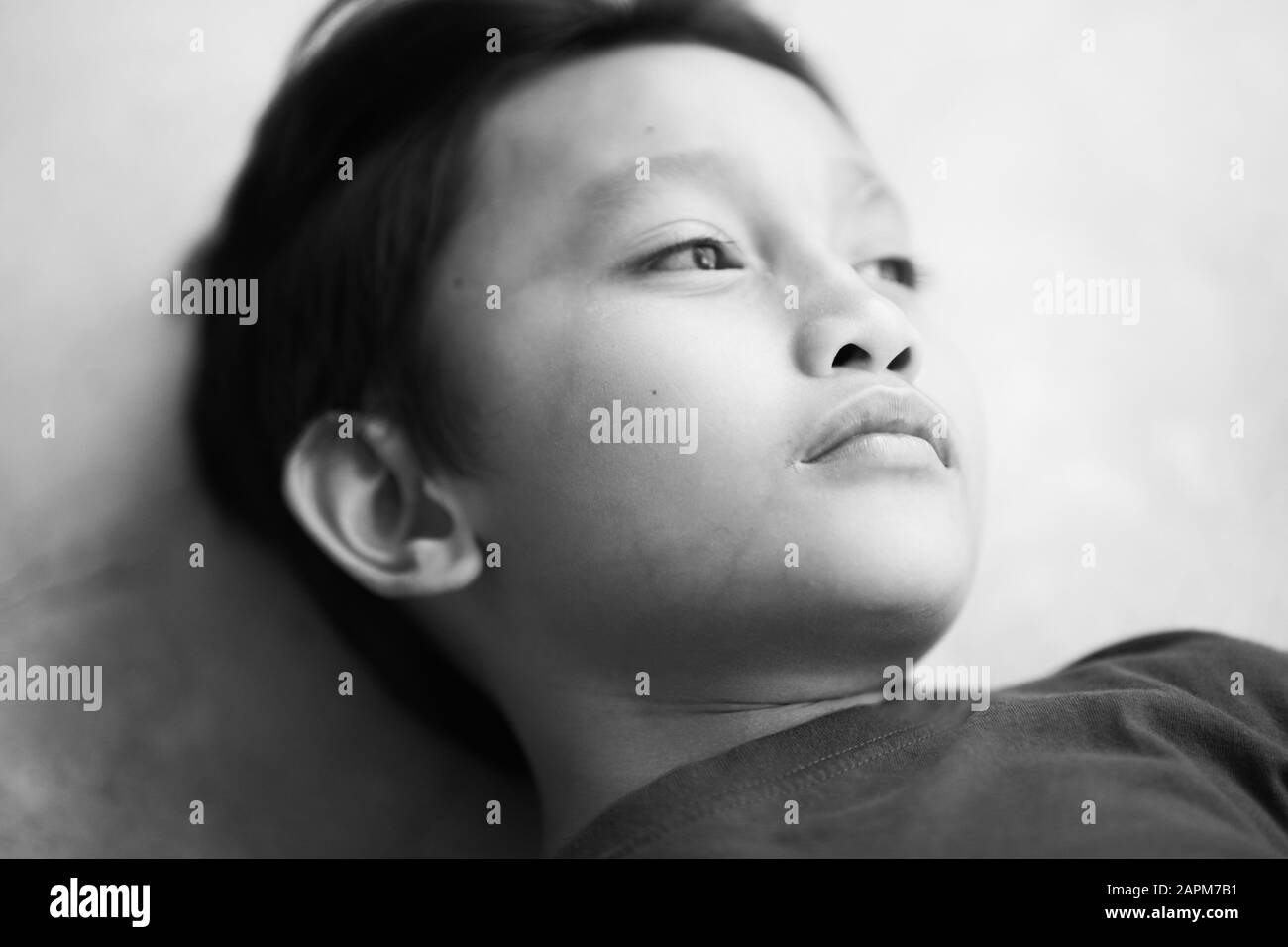 Little boy portrait close up face on concrete background Stock Photo
