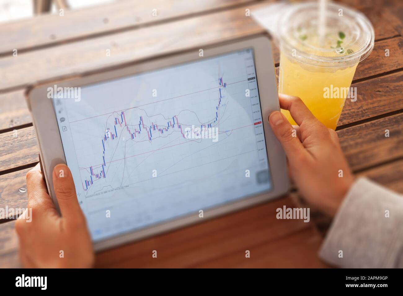 Woman hand trading online on tablet, stock photo Stock Photo