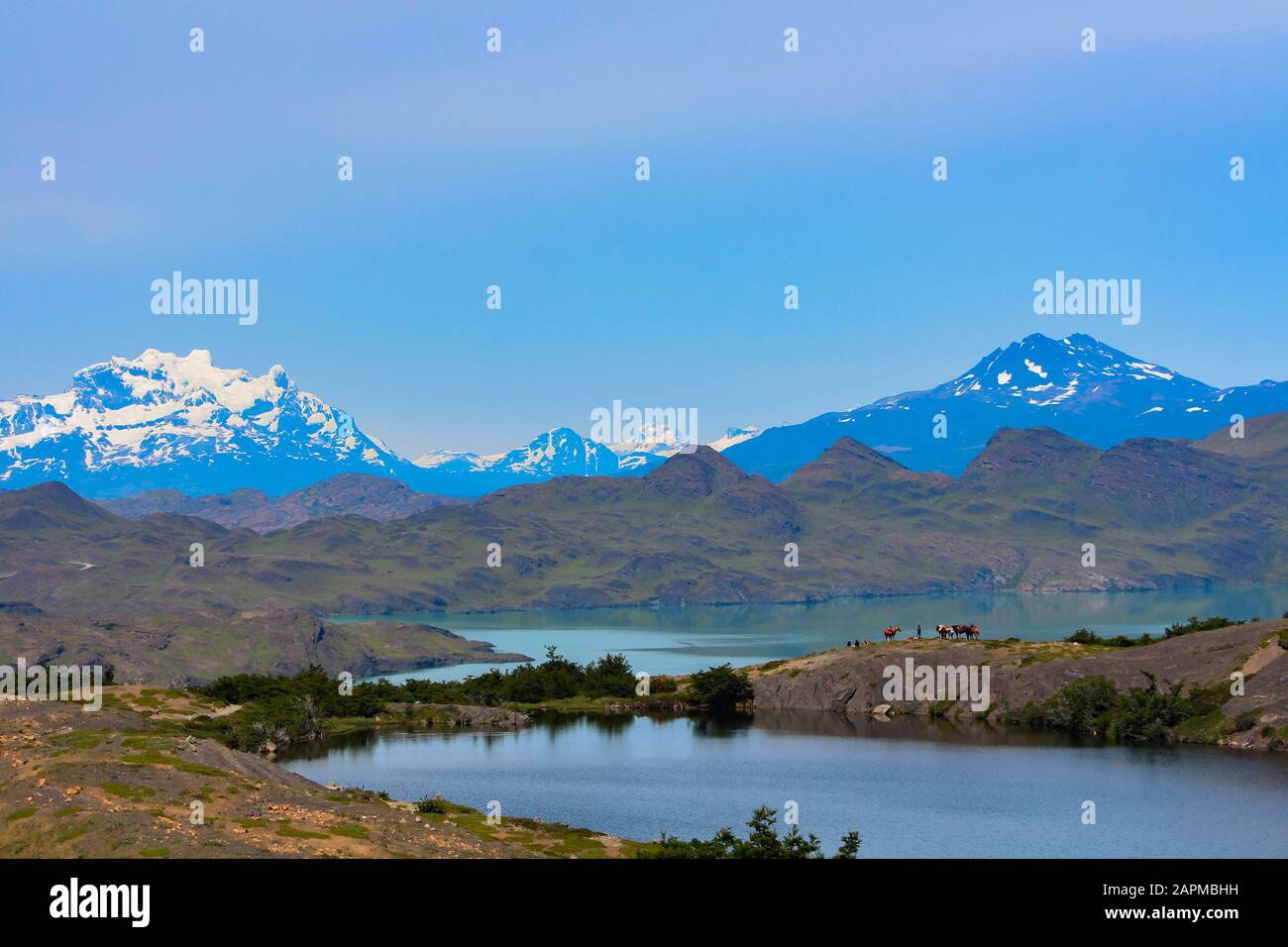 Torres del Paine National Park, Región de Magallanes y de la Antártica Chilena, Chile - December 4, 2018: Hikers and local trackers resting and enjoin Stock Photo