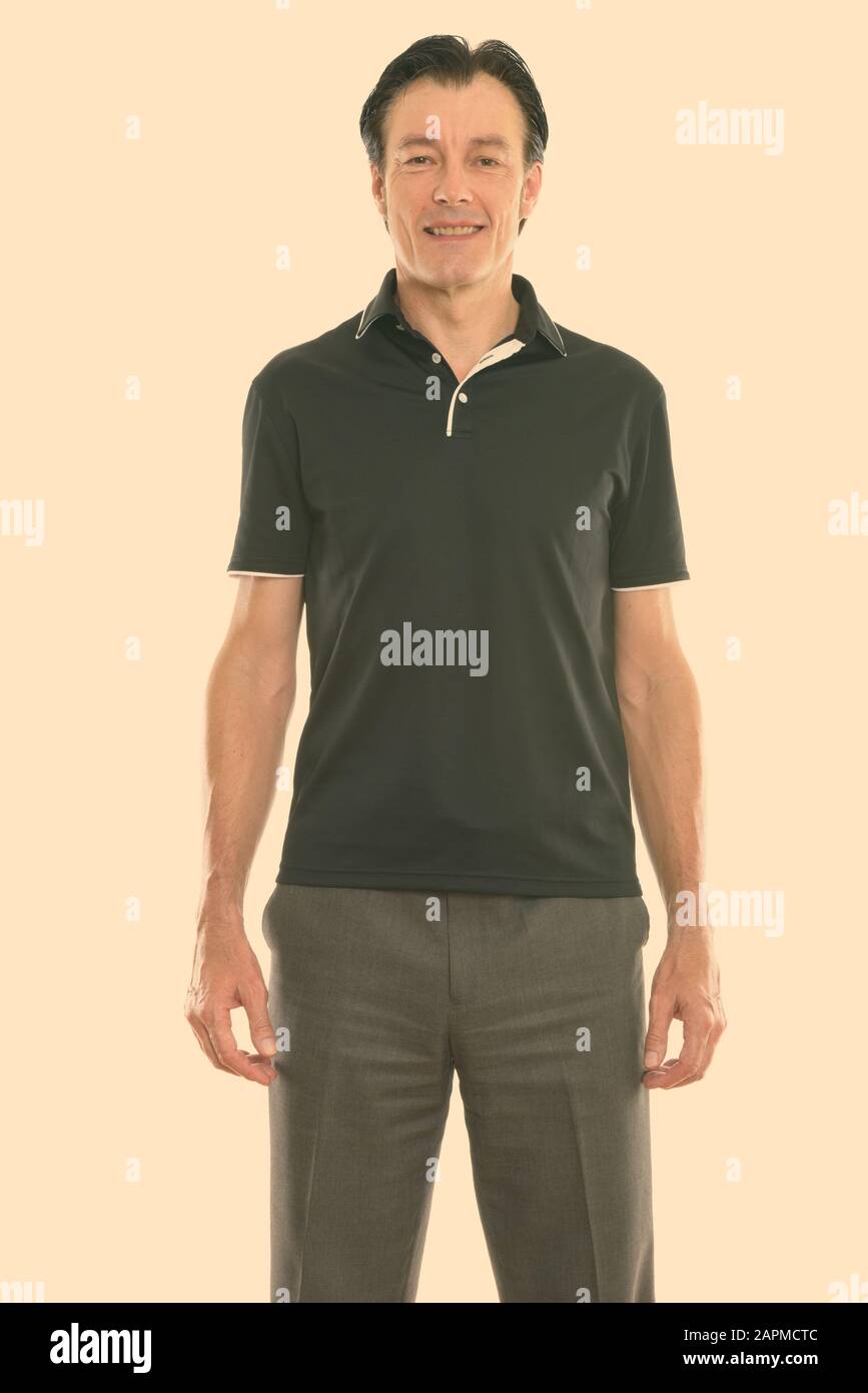 Happy handsome man standing hi-res stock photography and images - Alamy