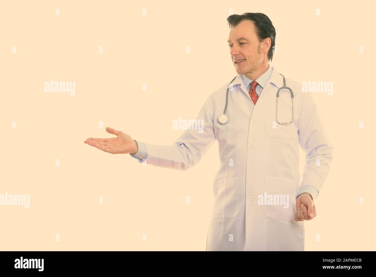 Smiling mature doctor showing hi-res stock photography and images - Alamy