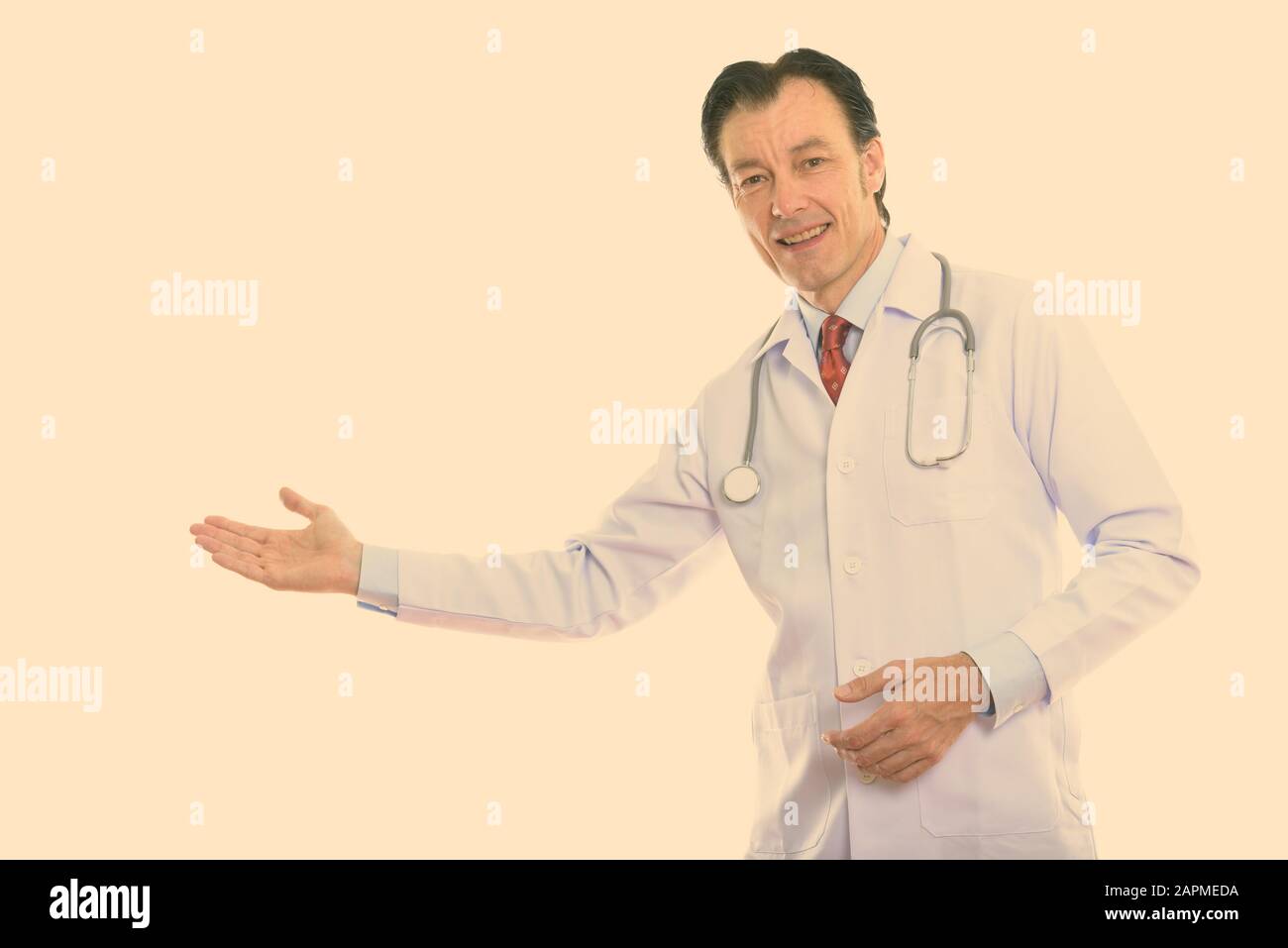 Smiling mature doctor showing hi-res stock photography and images - Alamy
