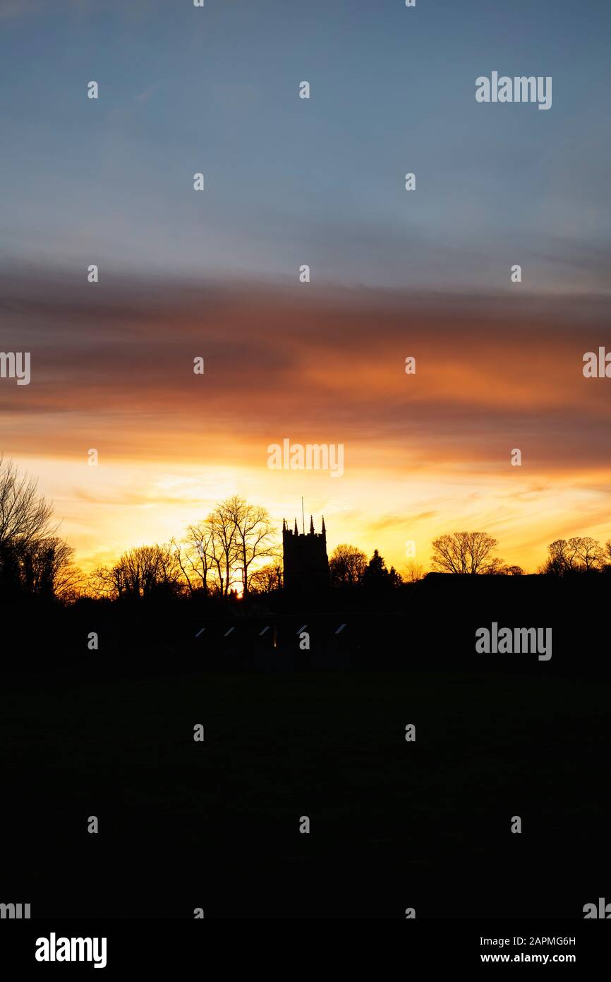 St James Church in the winter at sunset. Avebury, Wiltshire, England Stock Photo