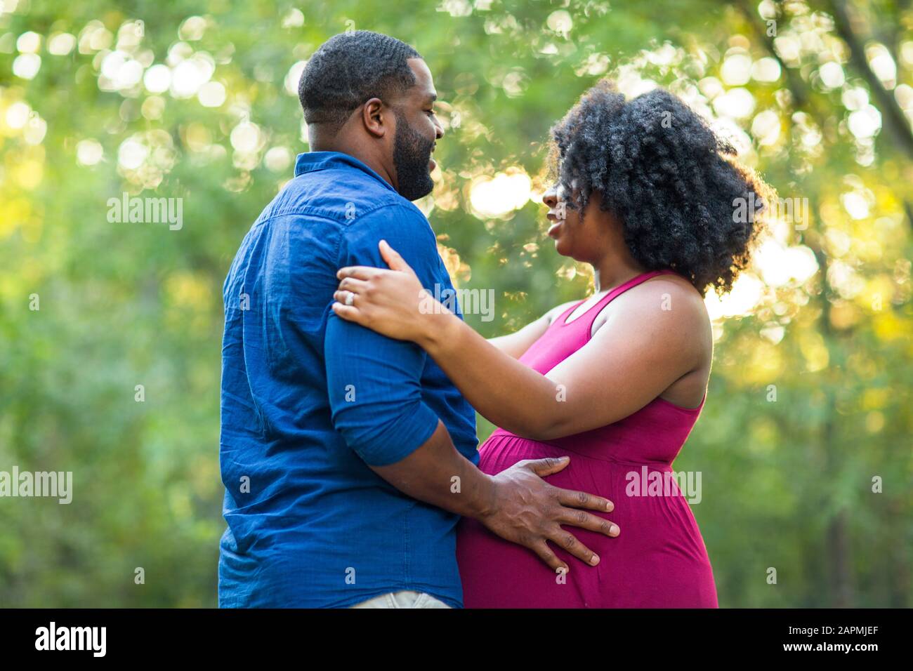 Wife african american husband embracing hi-res stock photography and ...