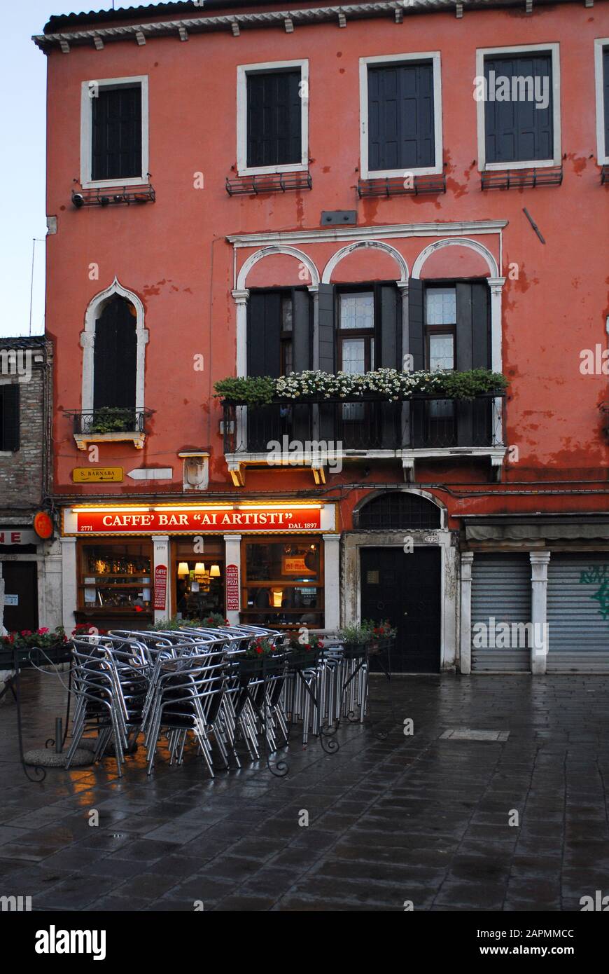 Cafe Bar 'Ai Artisti,' an Italian eatery on the Campo San Barnaba in Venice, Italy. Stock Photo