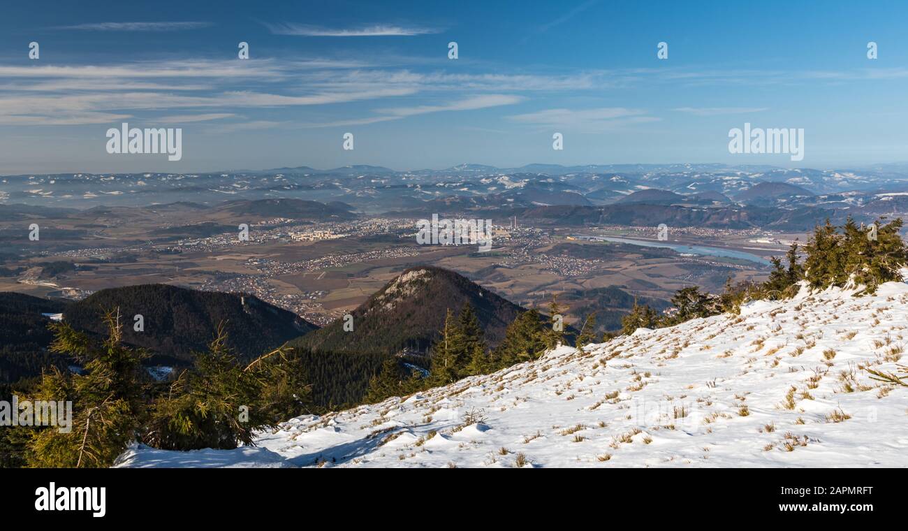 Zilina city with Vah river valley and hills on the background in Slovakia during nice winter day Stock Photo
