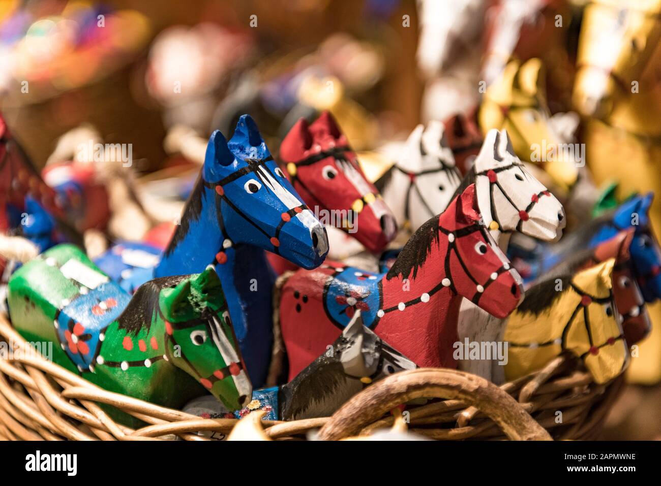 Hand carved wooden horse figures - traditional polish decorative handcraft. Polish culture, Kraków, Poland. Stock Photo