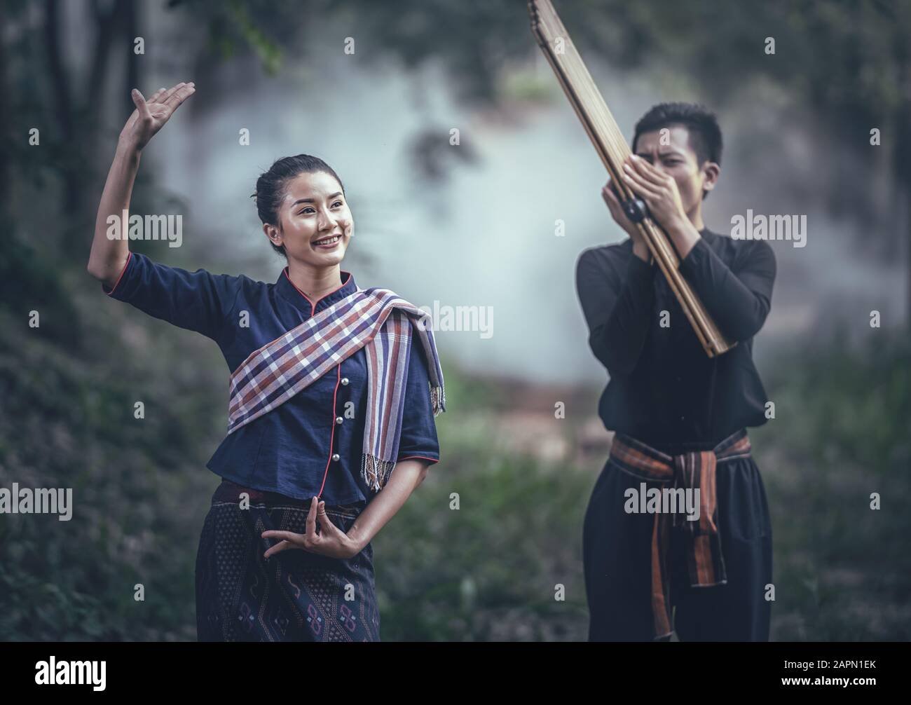 Thai traditional dance according to the rhythm of music by traditional northeastern reed mouth organ performance Stock Photo