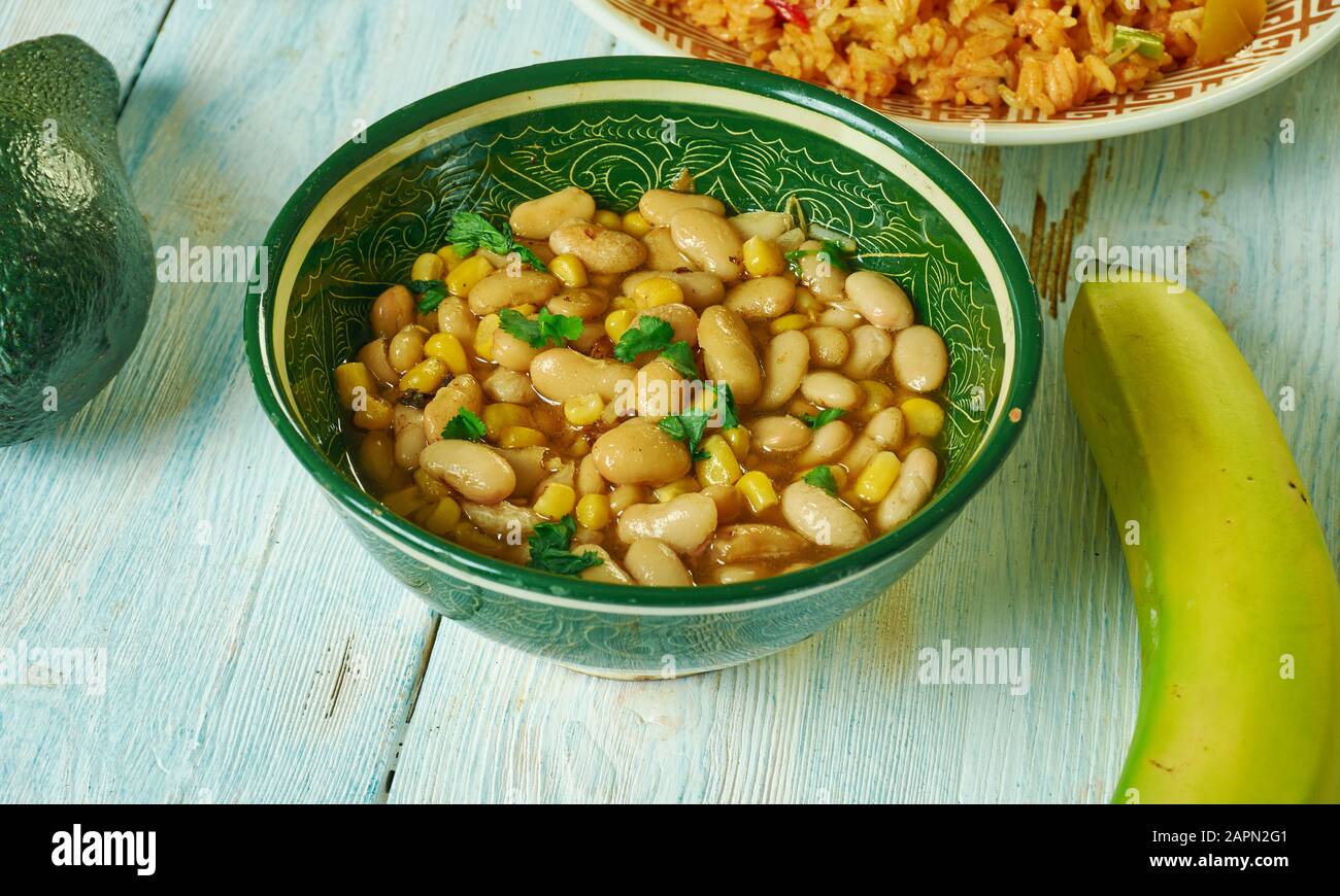 Githeri, maize and beans are mixed together in a sufuria,  Kenyan cuisine, Traditional assorted African dishes, Top view. Stock Photo