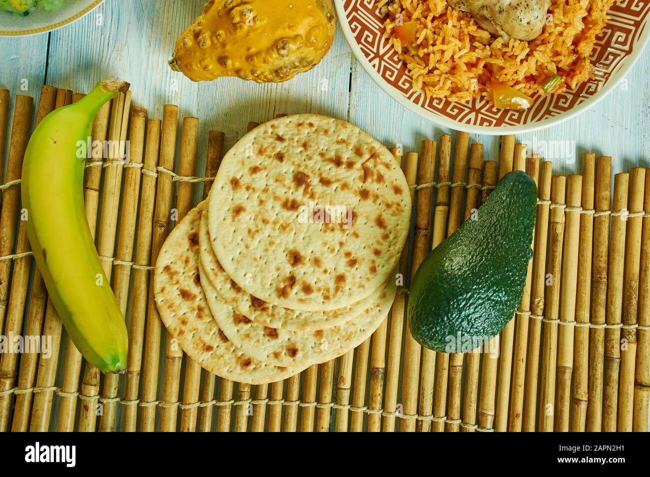 Chapatis,  unleavened flatbread, Kenyan cuisine, Traditional assorted African dishes, Top view. Stock Photo