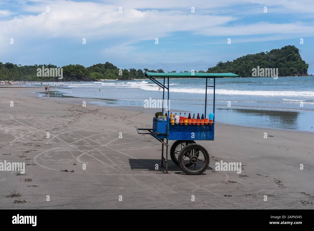 Wide shot of a street food cart placed in a sandy beach Stock Photo Alamy