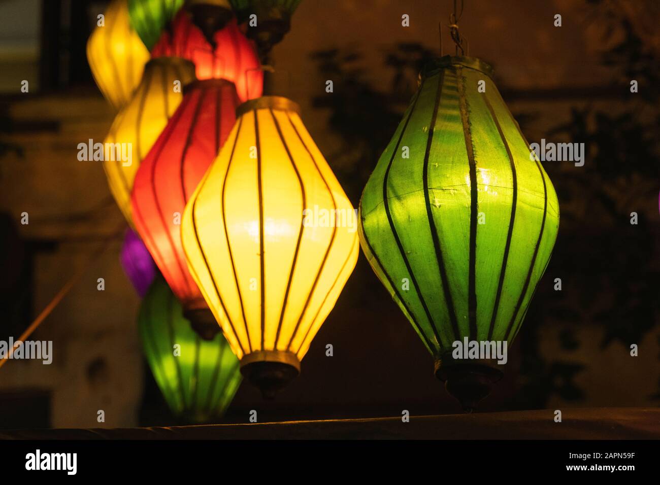 Beautiful decoration lanterns light on night market in Hoi An, Vietnam
