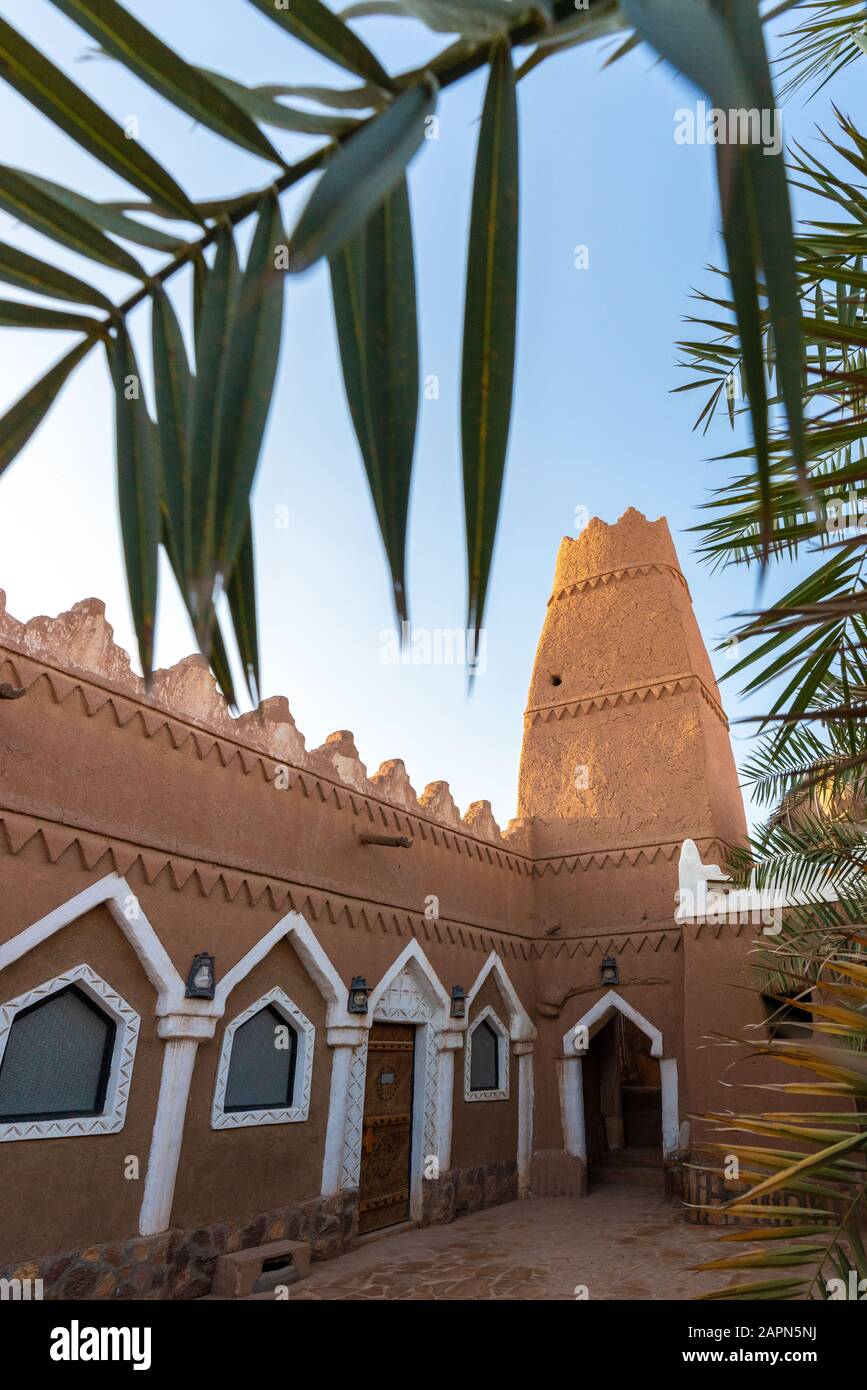 Historic and traditional mud mosque and minaret in Ushaiger heritage village, Saudi Arabia Stock Photo