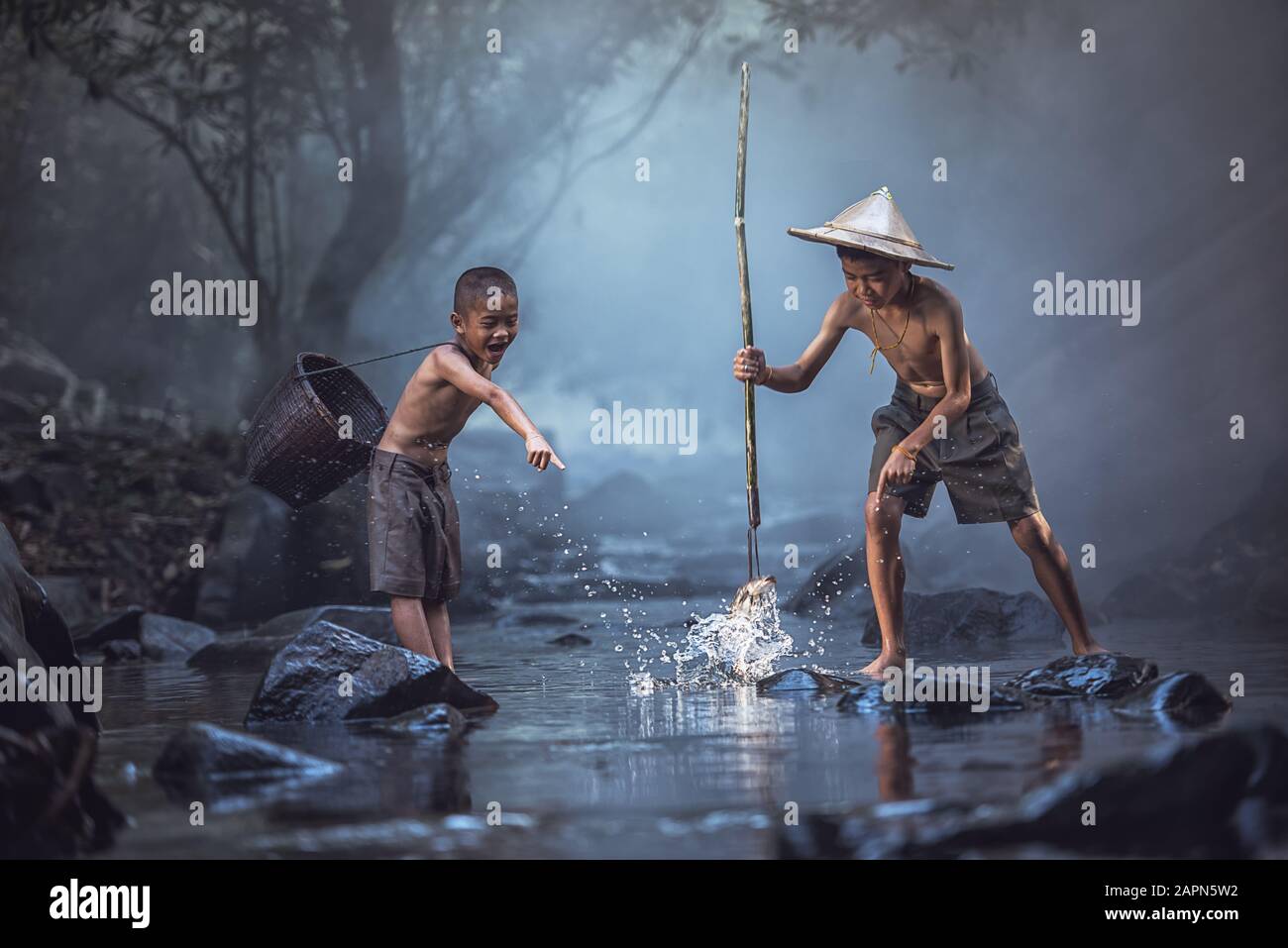 Two boys fishing river hi-res stock photography and images - Alamy