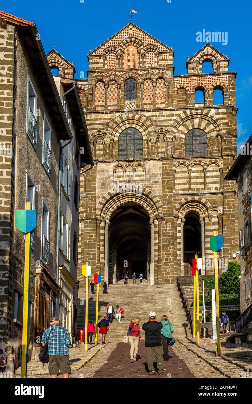 Facade, Cathedral of Annunciation, starting-point of Via Podiensis, pilgrim path to Santiago de Compostela, Le Puy en Velay Stock Photo