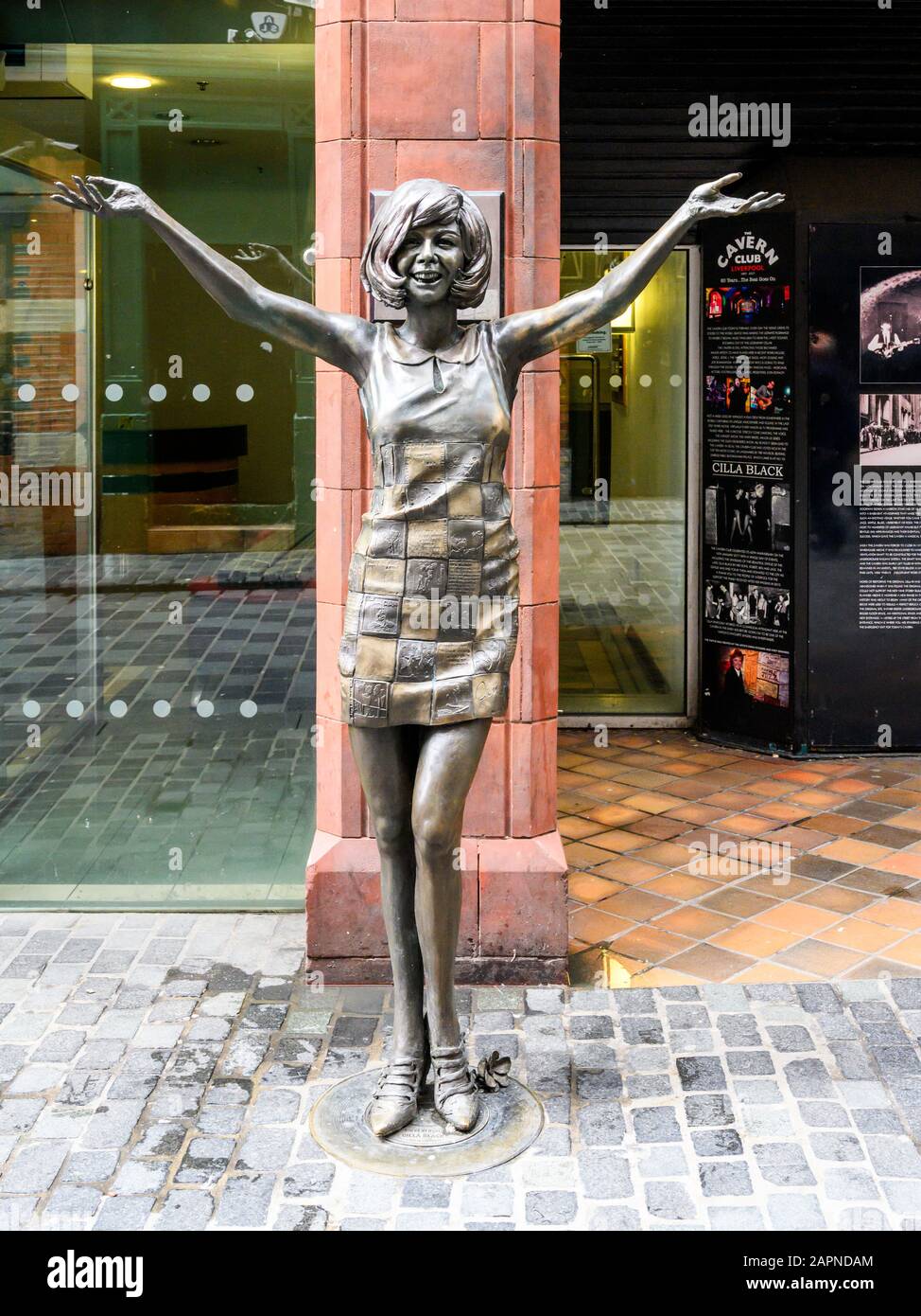 Bronze statue of the late singer and television presenter, Cilla Black OBE, in Mathew Street at the former entrance to the Cavern Club, Liverpool, UK. Stock Photo