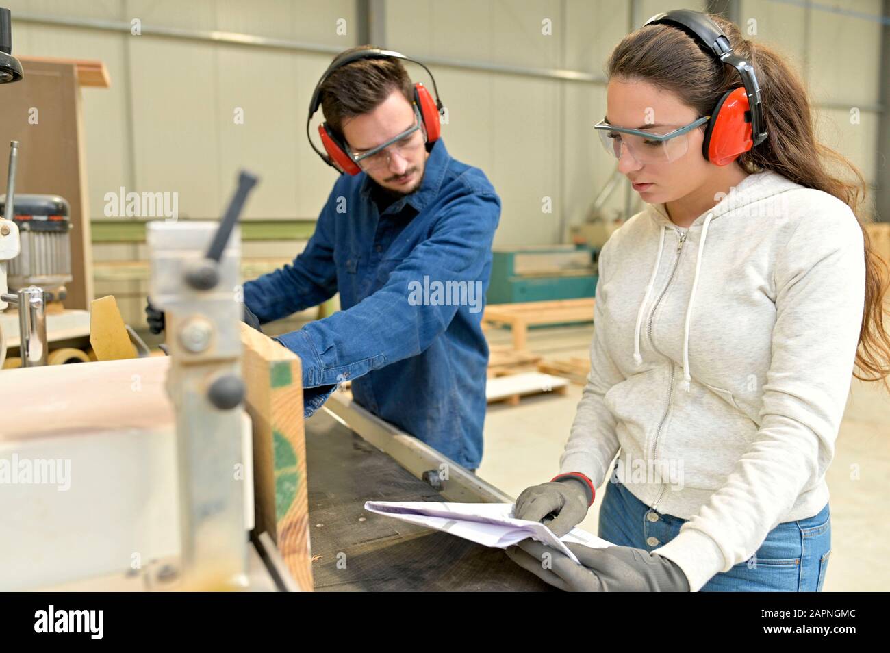 Students in carpentry doing a job training in workshop Stock Photo
