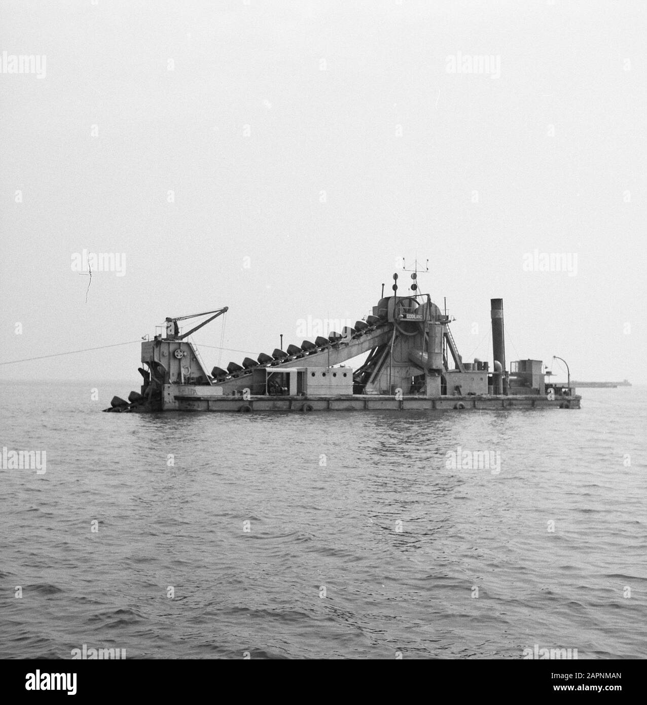 npc, pipelines, dredgers, dig trenches, gas pipes Date: 1966 Location: IJsselmeer Keywords: dredgers, gas pipelines, dig trenches, npc, pipelines Stock Photo