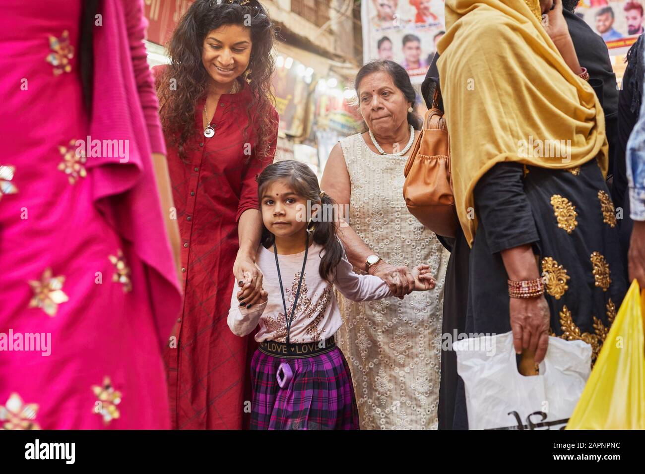 Family of three shopping at bazaar Stock Photo